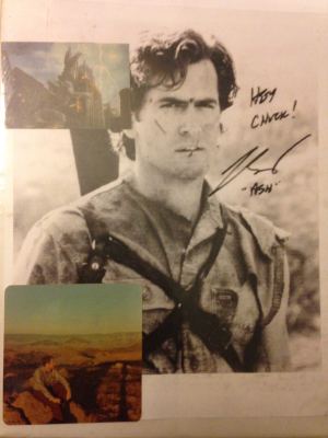 The front of the binder: the printed out photo of Bruce Campbell, the cutout of '98 Godzilla, and the picture of my father.